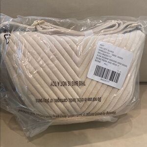 Anthropologie BRAND NEW Elegant Cream Velvet Sling Bag